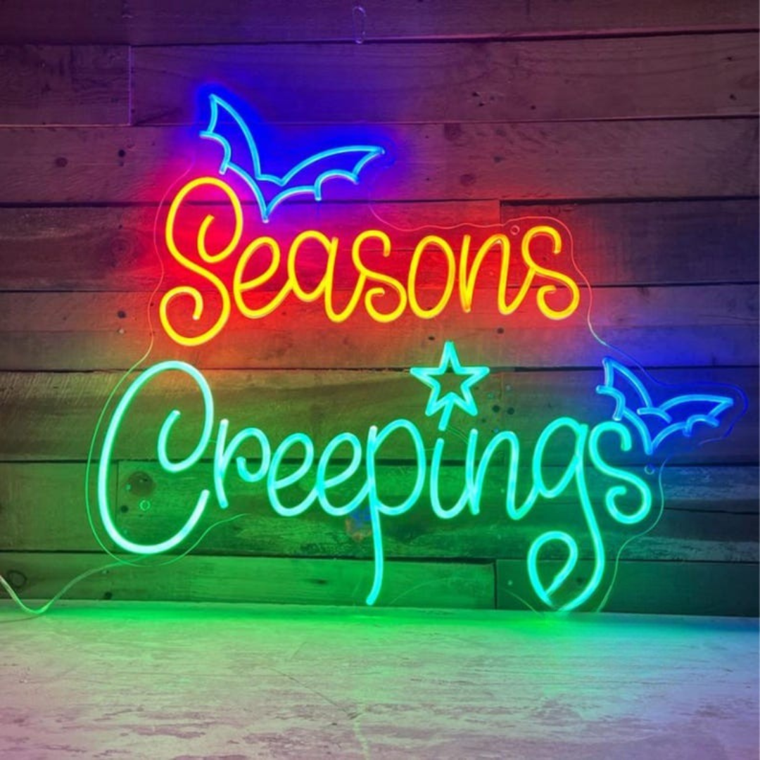 Seasons Creepings Halloween LED Neon Sign glowing in bright LED neon lights by Neon.Outshine