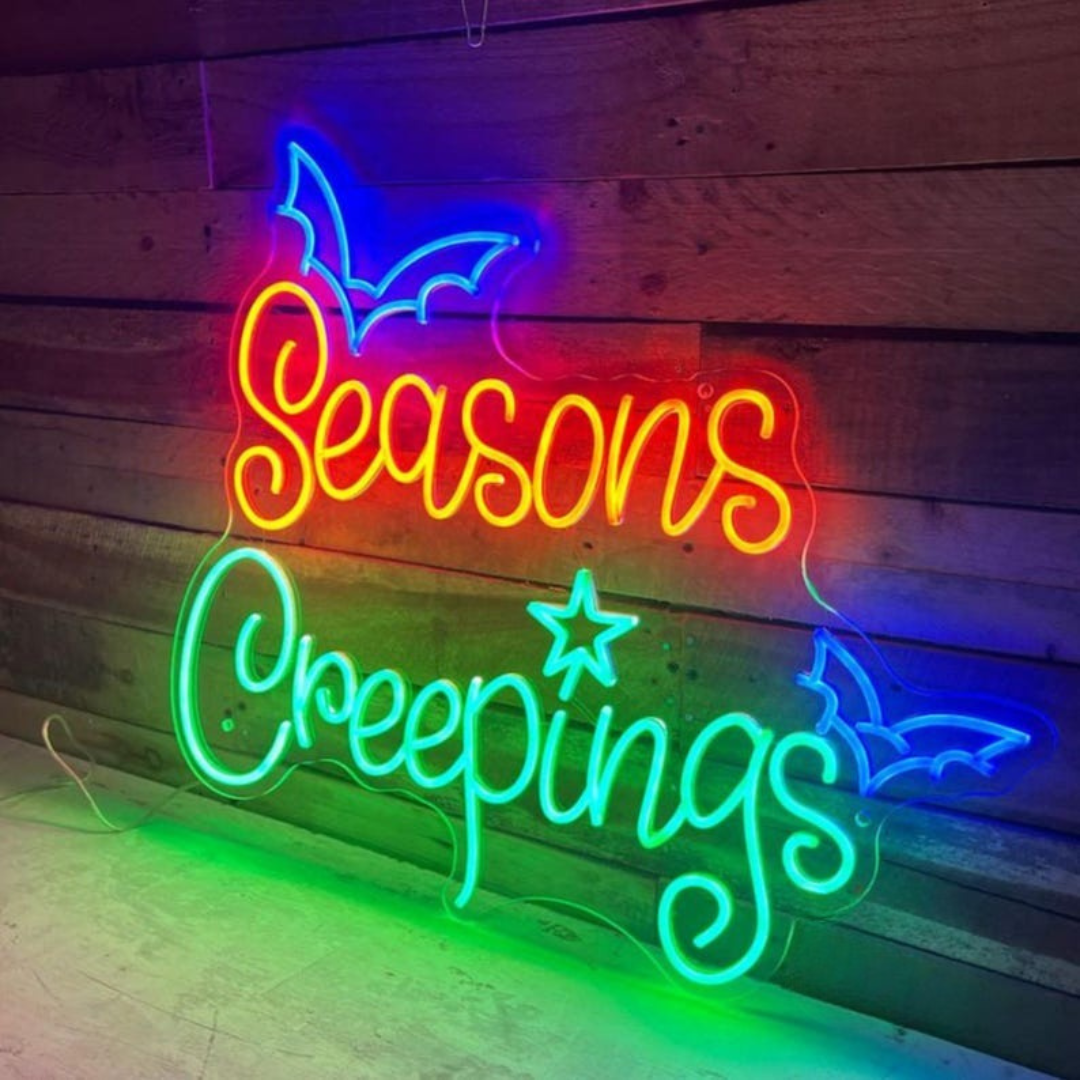 Seasons Creepings Halloween LED Neon Sign glowing in bright LED neon lights by Neon.Outshine