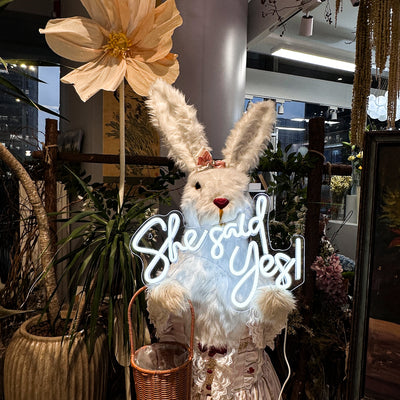 She Said Yes Wedding Neon Sign by Neon.Outshine glowing in elegant LED light at an engagement celebration backdrop.