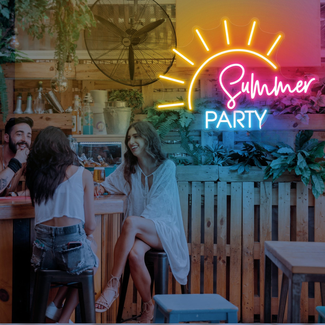 Summer Party Neon Sign by Neon.Outshine in bright yellow, coral pink, and aqua blue with playful, tropical -themed lettering.