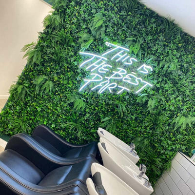 This is the Best Part” neon sign in vibrant LED lighting, mounted on a clear acrylic board, glowing in a stylish indoor space – Neon.Outshine 