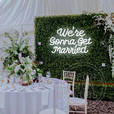 We’re Gonna Get Married Neon Sign by Neon.Outshine glowing beautifully as a romantic backdrop for an engagement or wedding celebration.