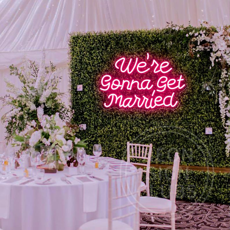 We’re Gonna Get Married Neon Sign by Neon.Outshine glowing beautifully as a romantic backdrop for an engagement or wedding celebration.