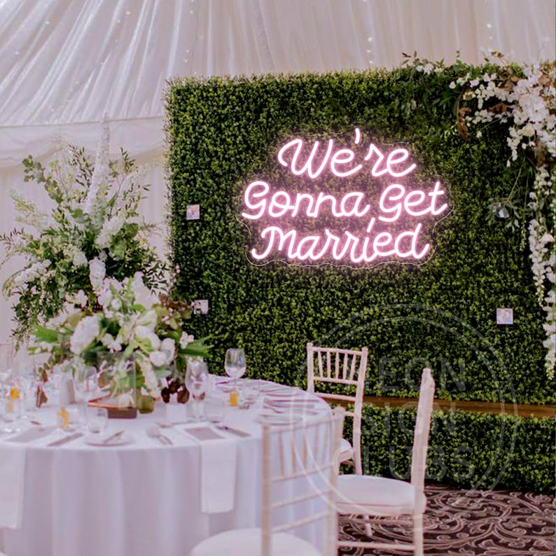 We’re Gonna Get Married Neon Sign by Neon.Outshine glowing beautifully as a romantic backdrop for an engagement or wedding celebration.