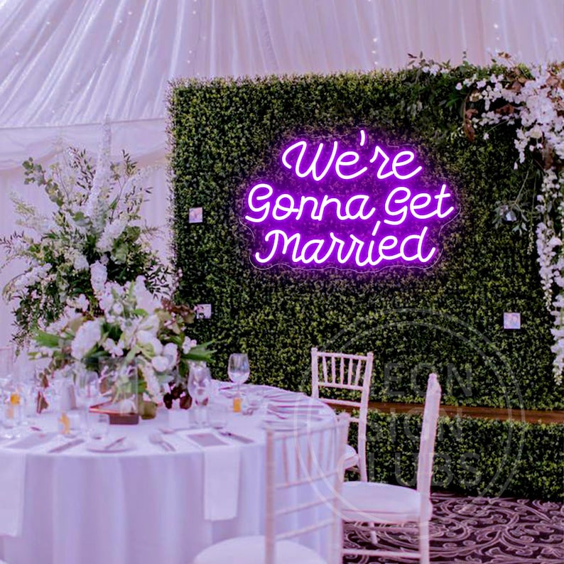 We’re Gonna Get Married Neon Sign by Neon.Outshine glowing beautifully as a romantic backdrop for an engagement or wedding celebration.