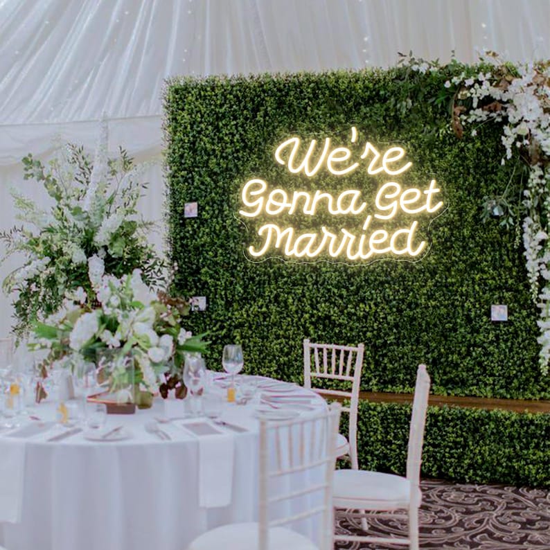 We’re Gonna Get Married Neon Sign by Neon.Outshine glowing beautifully as a romantic backdrop for an engagement or wedding celebration.
