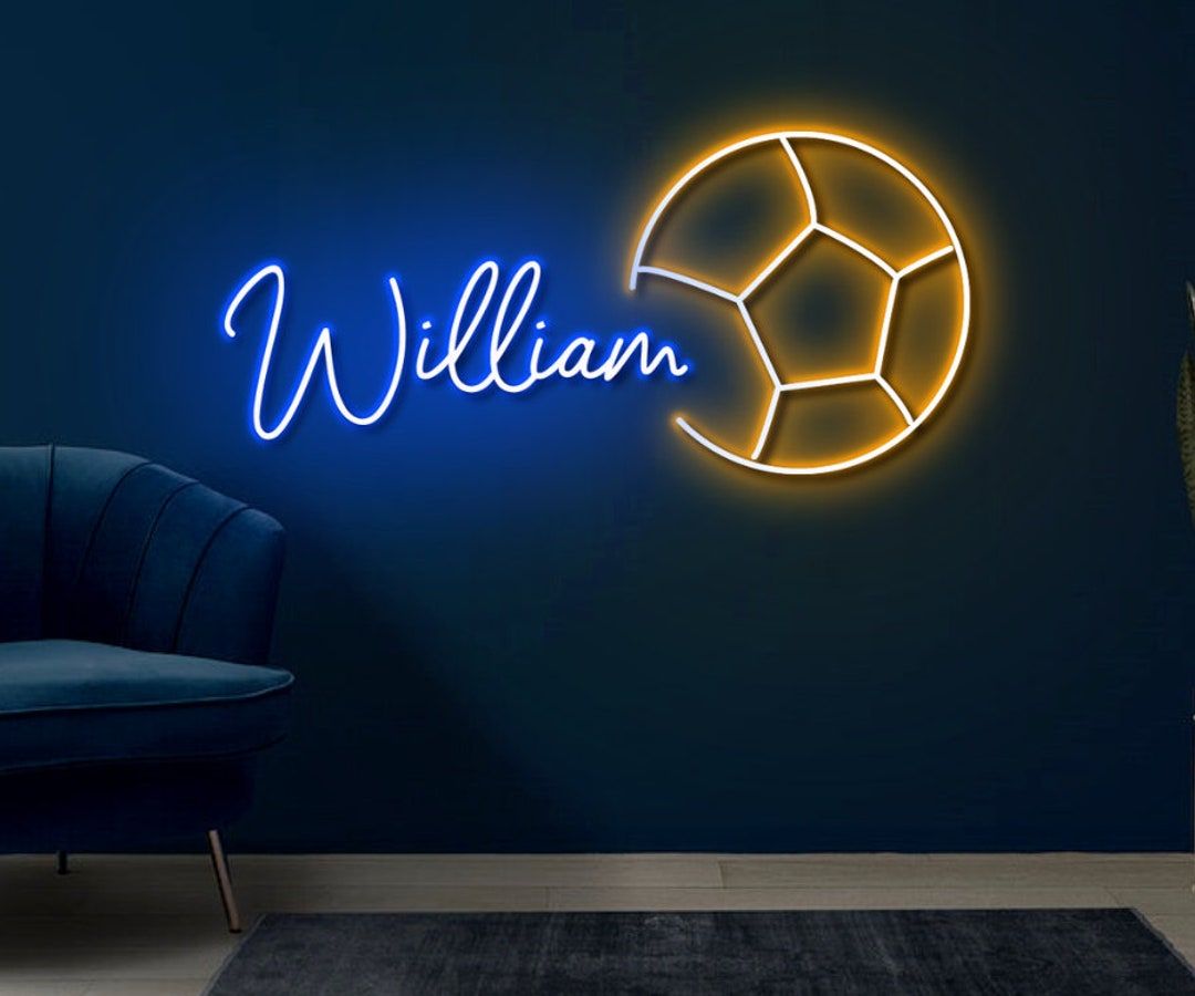 William Name Neon sign by Neon.Outshine - mounted on a clear acrylic panel and lighting up a stylish room interior.